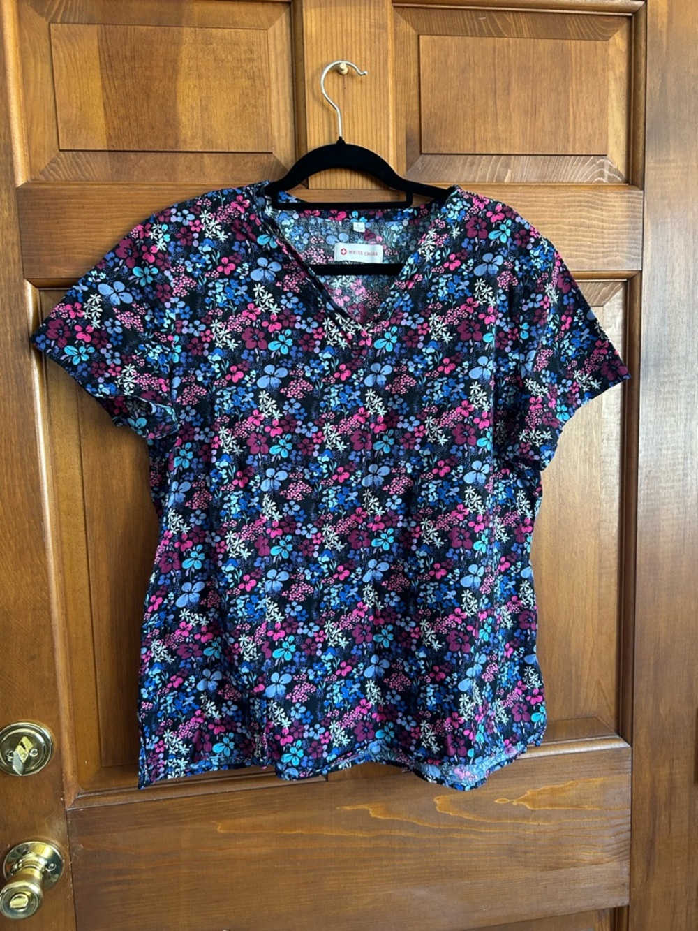 White Cross Black Floral V-Neck scrub Top with Pink & Blue Blooms